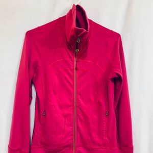 Lululemon Athletica pink running jacket.